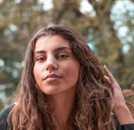 Brunette woman outdoor portrait.